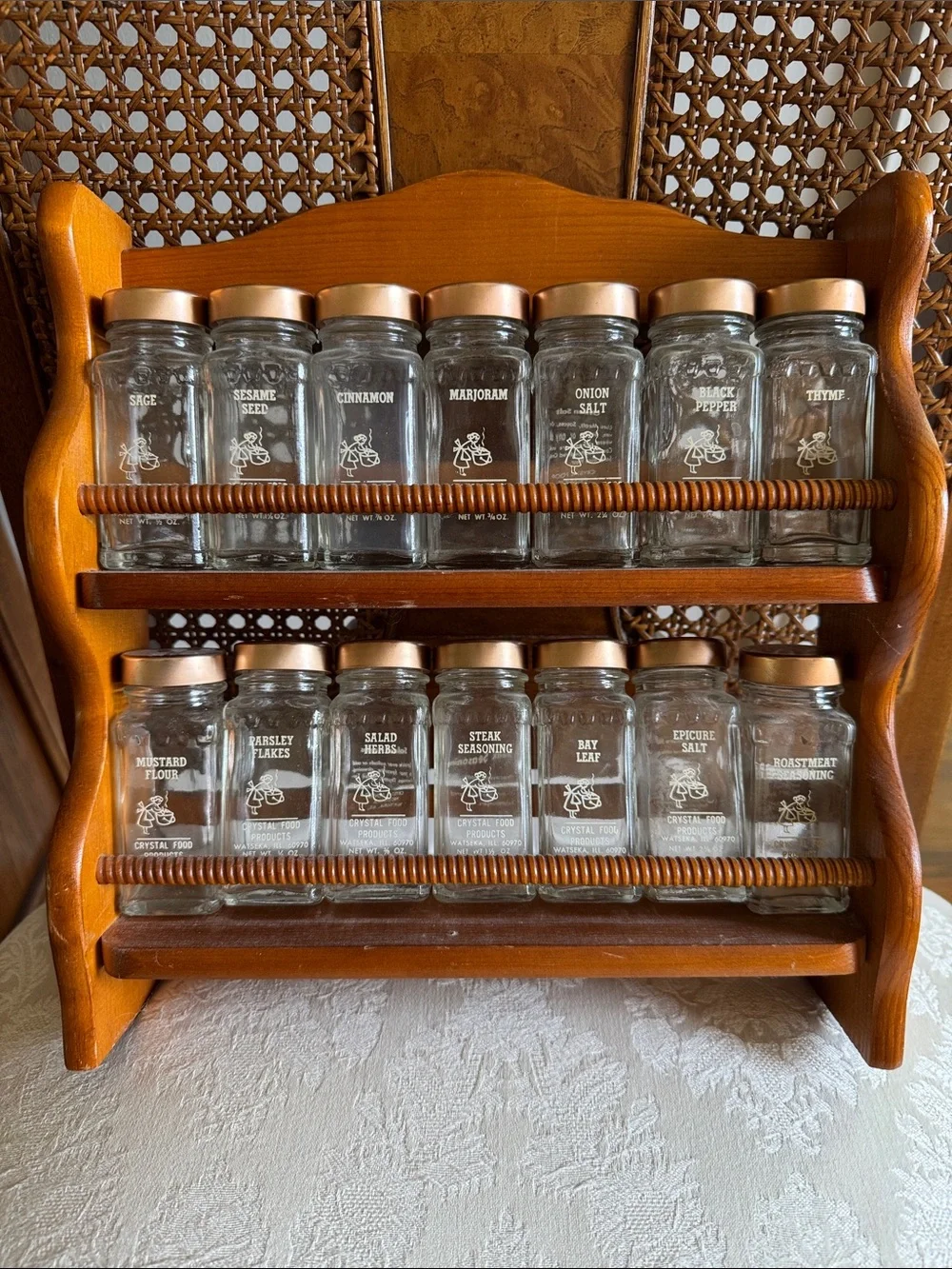 Vintage Glass Spice Jar Set with Copper Lids on Wooden Rack